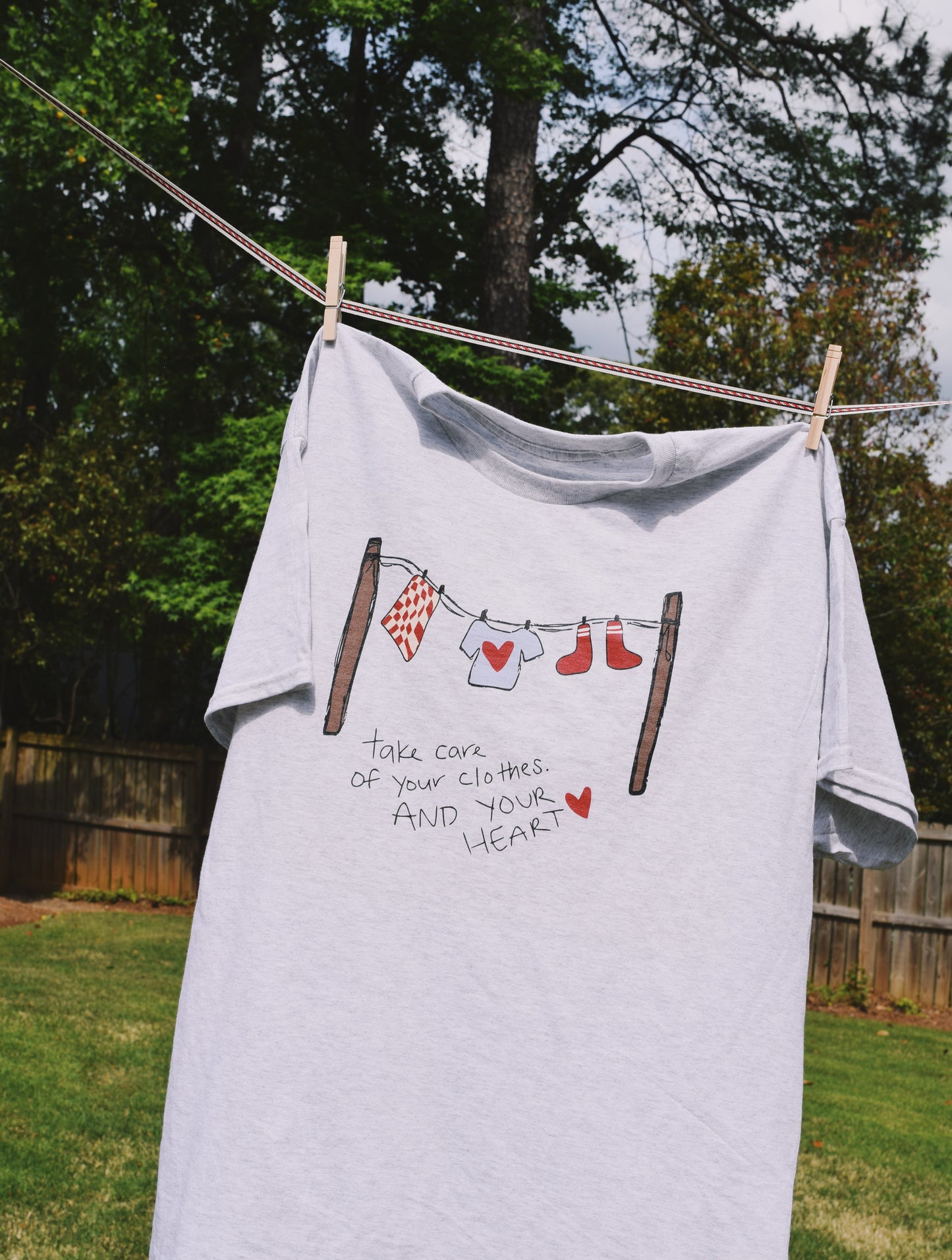 "Take Care" Clothesline Tee