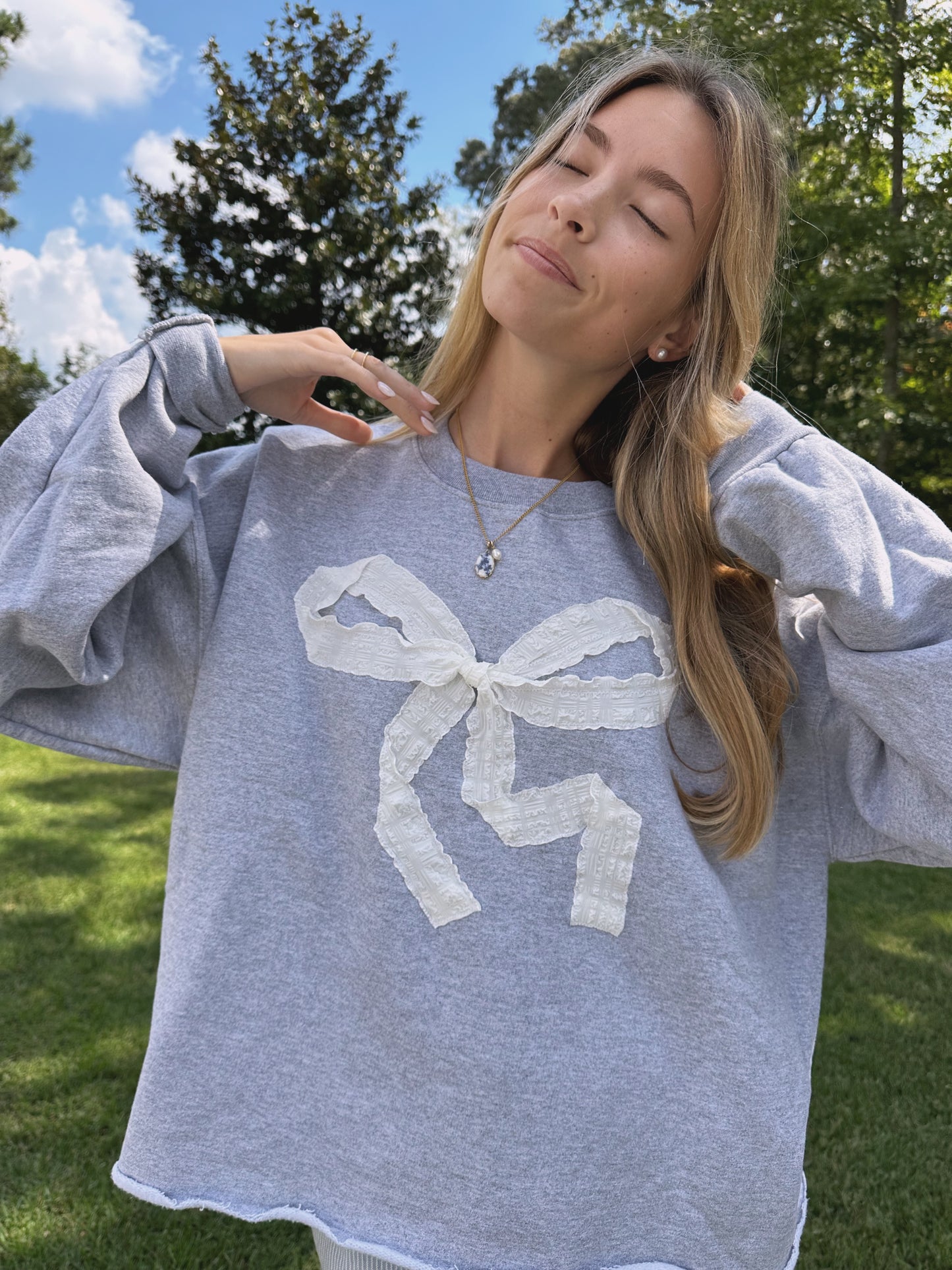 Deluxe White Bow Crewneck