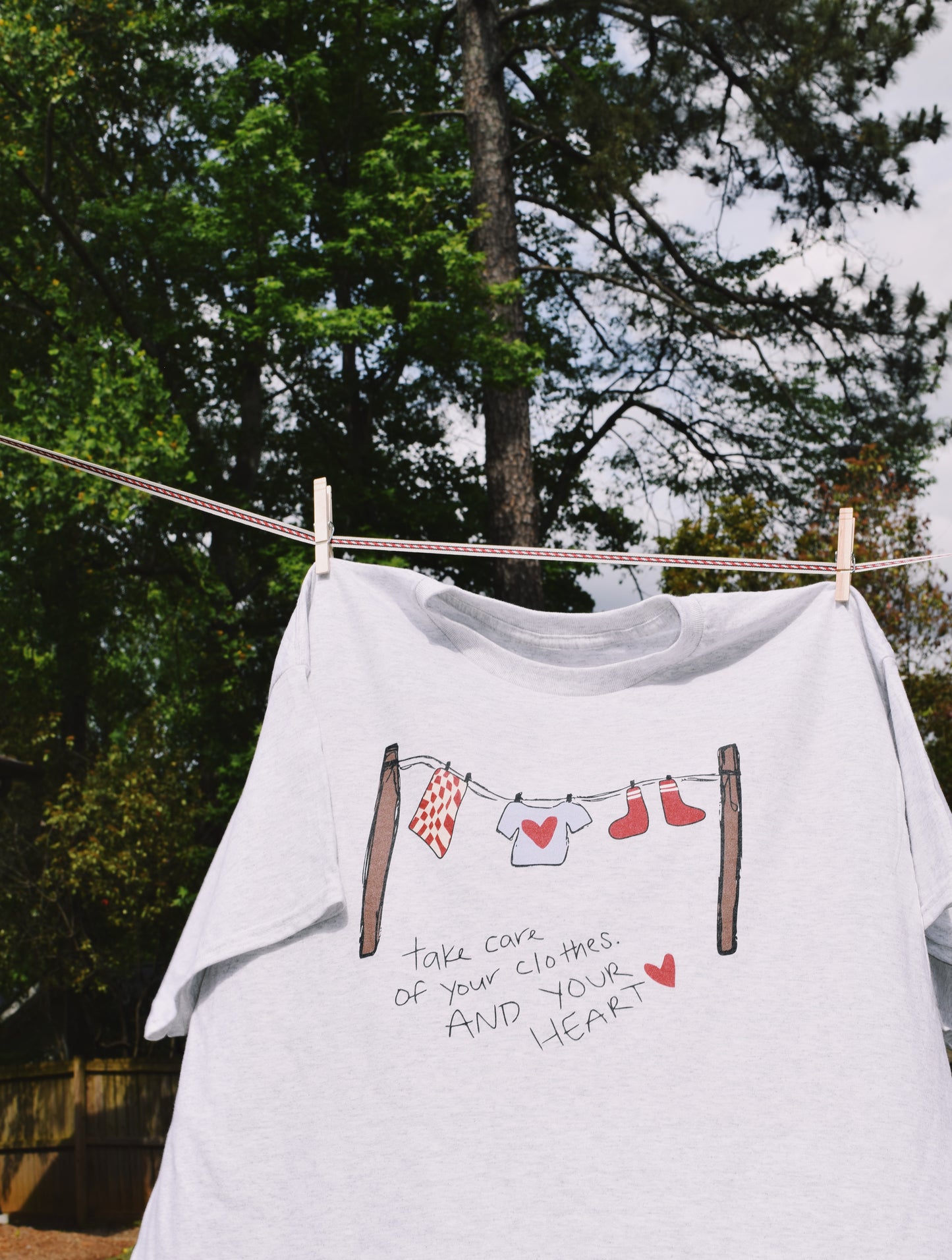 "Take Care" Clothesline Tee